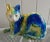A terrific Italian hand painted and glazed reclining ceramic cat with a crackle finish. Featuring a very human face and a...