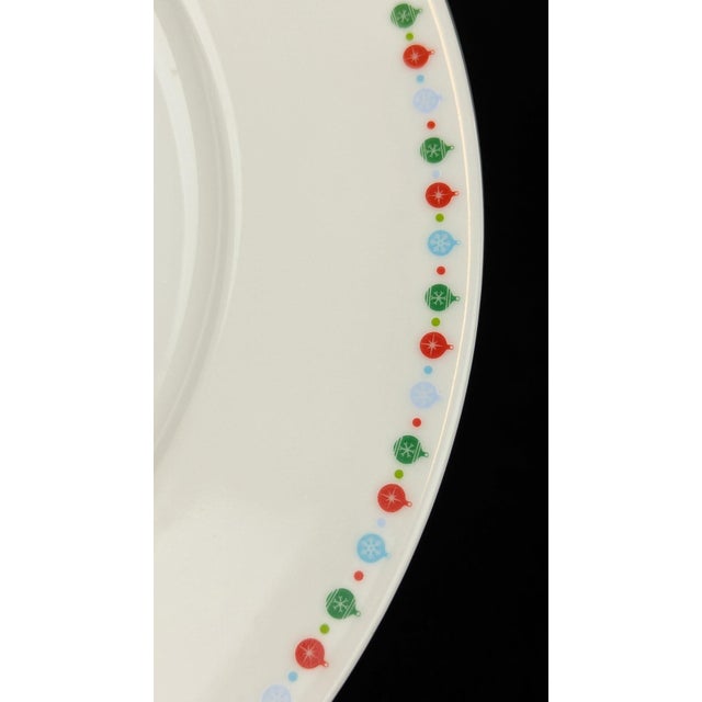 Wonderfully nostalgic Rudolph the Red Nosed Reindeer and Santa serving plate based on the beloved Rankin/Bass holiday...