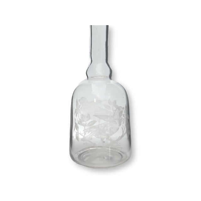 Vintage crystal decanter with hand-etched birds. Decorated on all sides. Purchased in Paris. No maker's mark.
