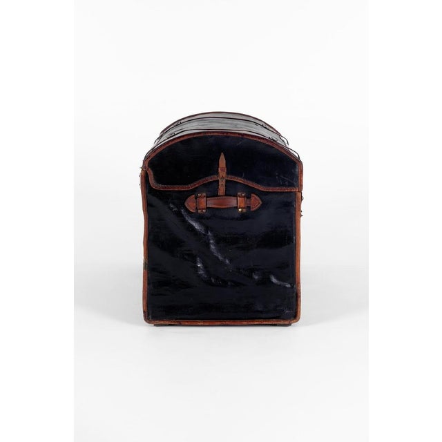 A wonderful late 19th-century leather steamer trunk. The trunk is made of canvas and has been leather-mounted around a...