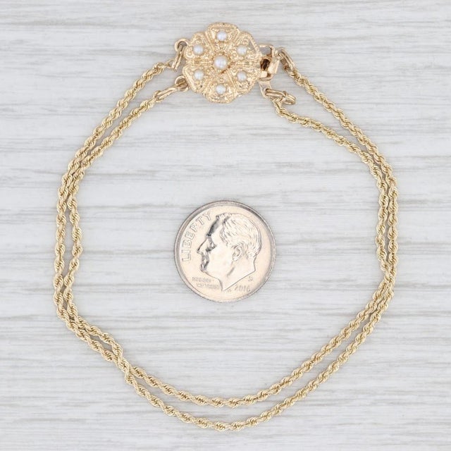 Gemstone Information: - Cultured Pearls - Size - 2- 2.5 mm Cut - Round Bead Shape Color - White Metal: 14k Yellow Gold...