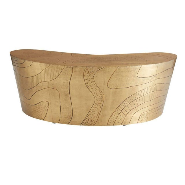 The contour lines and relief features of topographic maps influenced the etched brass surface of Glasgow. Cladded in a...