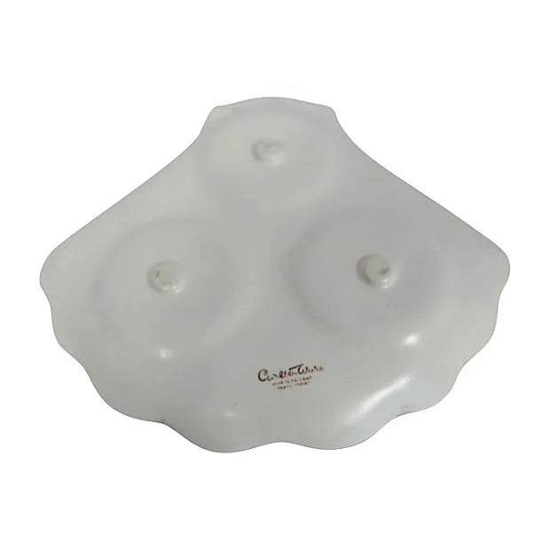 Four-piece Carlton Ware shell cruet set. Shakers, 1.75"Dia x 3.5"H; mustard pot, 2.25"Dia x 2.75"H; tray, 6.5"L x 6.25"W...