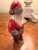 This is an “American Santa,” from Vaillancourt Folk Art, 1994. He is special. He has fabulous striped mittens and his...