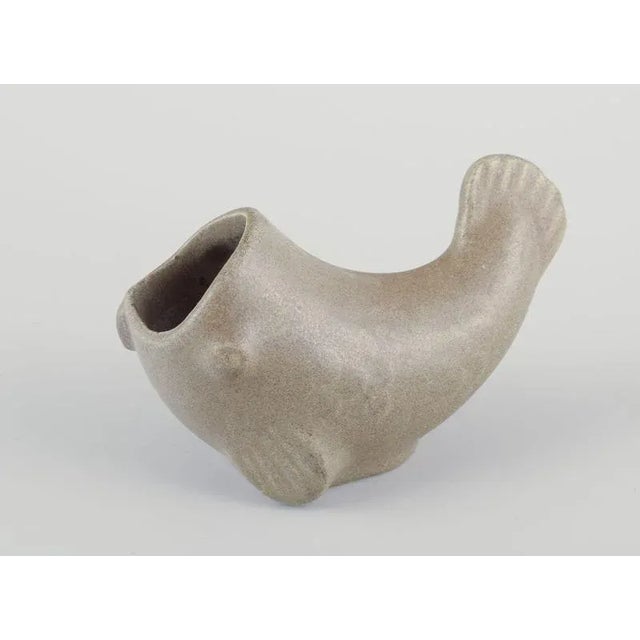 Arne Bang (1901-1983), ceramic vase in the shape of a fish with an open mouth. Glaze in sand-coloured shades. Mid-20th...