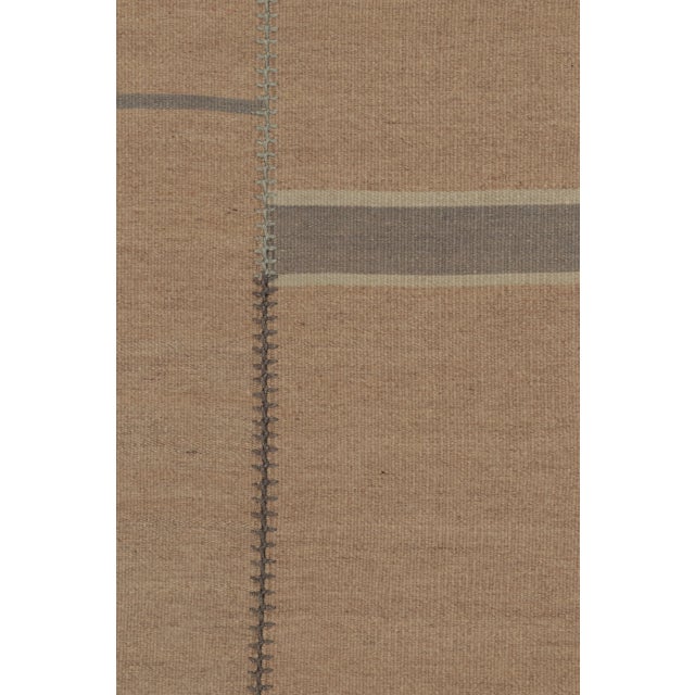 This 7x10 contemporary geometric kilim rug is a sophisticated new addition to Rug & Kilim’s curation; an informative...