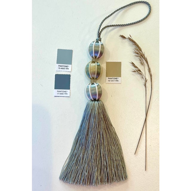 Add Bohemian charm to your home with this satin beaded key tassel in Bluestone and antique gold colors. This decorative...