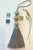 Add Bohemian charm to your home with this satin beaded key tassel in Bluestone and antique gold colors. This decorative...