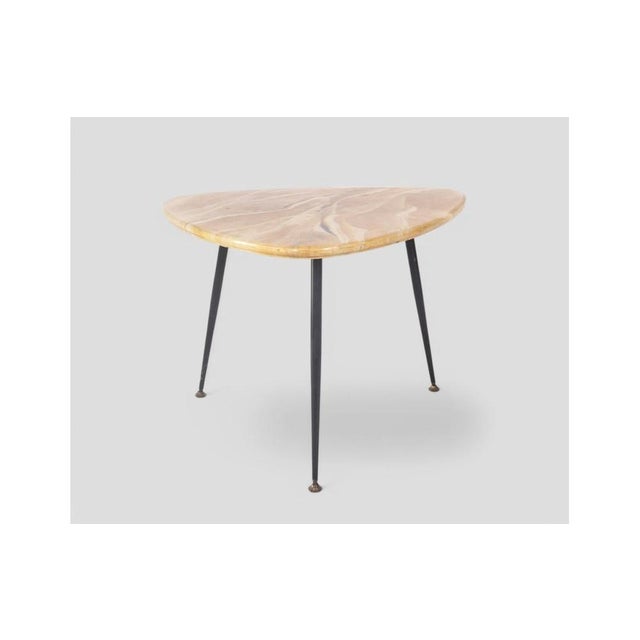 A small gem of mid-century Italian design, this coffee table captures the light and playful spirit of the 1950s–60s. Its...
