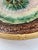 Nice size oval Victorian majolica ceramic platter. Large green leaf decorates the center of the dish. Probably British.
