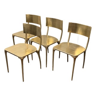 Cb2 Oro Gold Dining Chairs, Set of Four For Sale