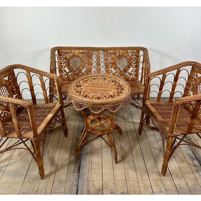 Antique rattan garden furniture set dating from the 1920s, in the Victorian style. A rare and charming set, comprising a...