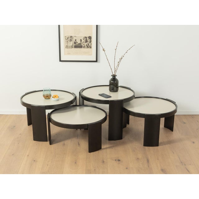 Exclusive nesting tables, model 783, by Gianfranco Frattini for Cassina from the 1960s. High-quality black lacquered...