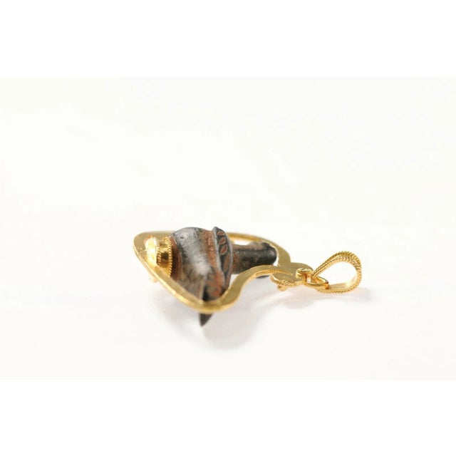 An absolutely stunning bird pendant made lovingly with an ancient Roman artifact and set in 21k gold. This was created...
