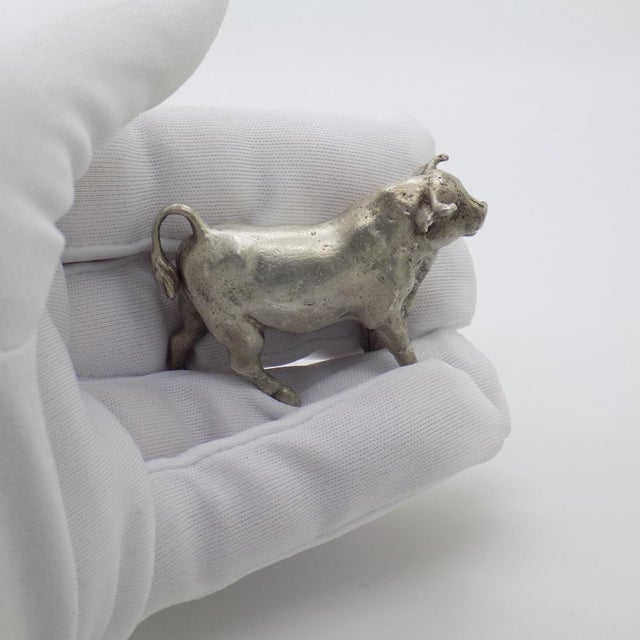 An important vintage miniature depicting a bull, handcrafted in Italy between the 1940s and 1950s in authentic Italian...