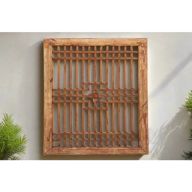 A traditional architectural feature of Chinese buildings, this beautiful antique Chinese lattice window was prominent in...