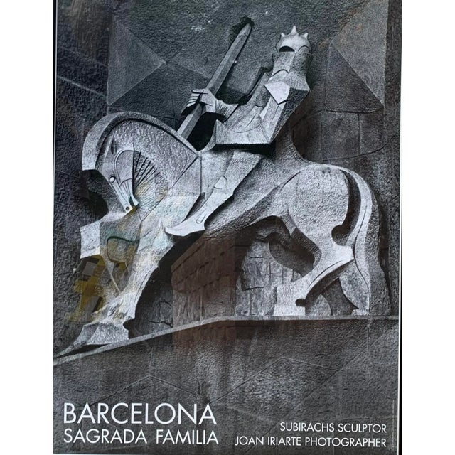Vintage black & white poster of Spanish sculpture by Joan Iriarte. In original metal frame, measures 24 x 32”.
