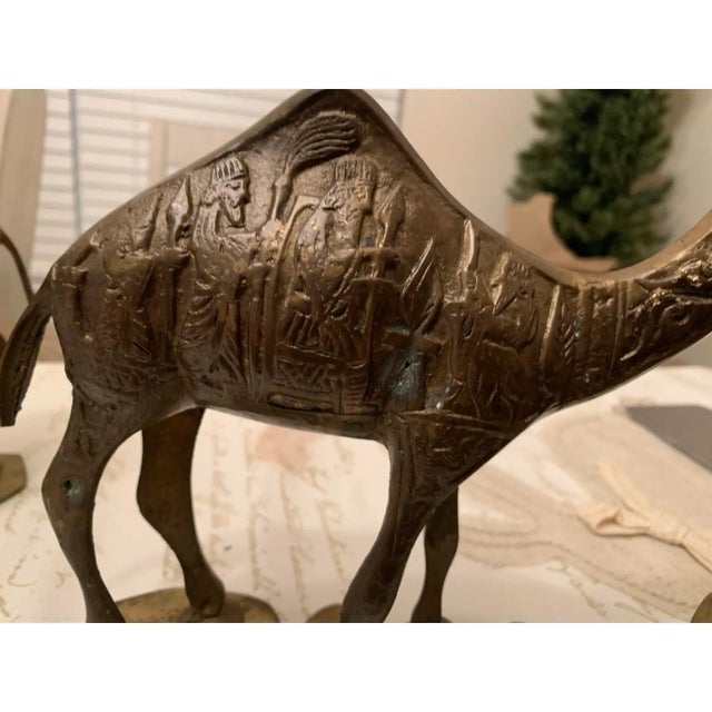 Vintage Mid-Century Brass Camel Bookends With Ornate Hieroglyphs and Symbols - a Pair For Sale - Image 4 of 12