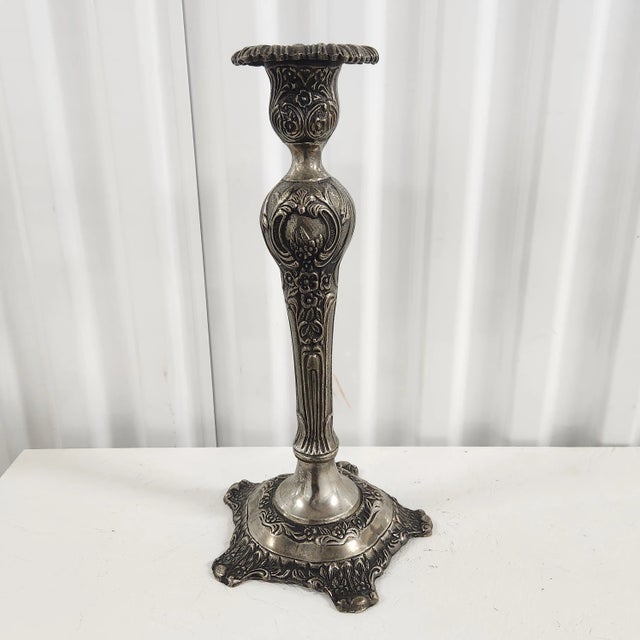 Grace and grandeur come together in this beautifully detailed vintage silverplate candlestick, crafted in India and richly...