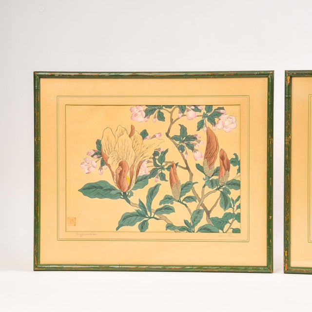 A stunning, authentic pair of mid-century Japanese woodblock prints featuring classical botanical designs by the legendary...
