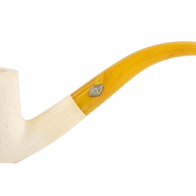 This elegant pipe is crafted from meerschaum, a material highly prized for its ability to deliver a cool, dry smoke and...