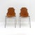 Iconic leather and metal side chairs selected by Charlotte Perriand for the Ski resort Les Arcs in 1960, with chrome...