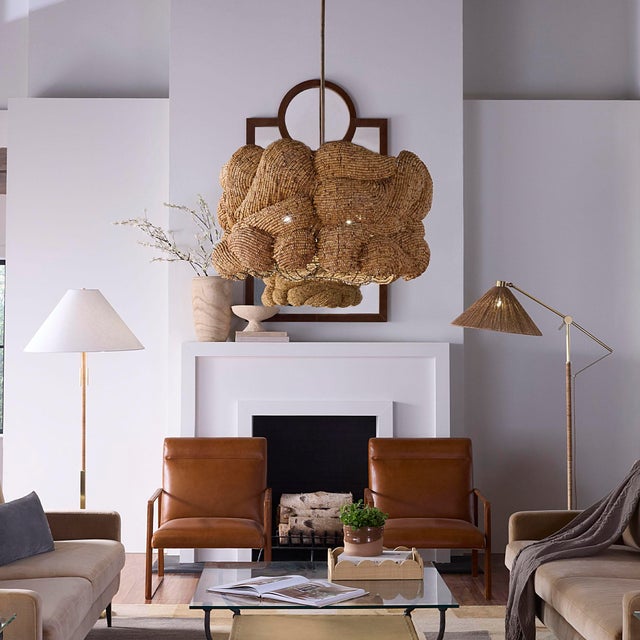 Made with care from natural mango wood beads and antique brass, this artisan chandelier brings both warmth and artistry to...