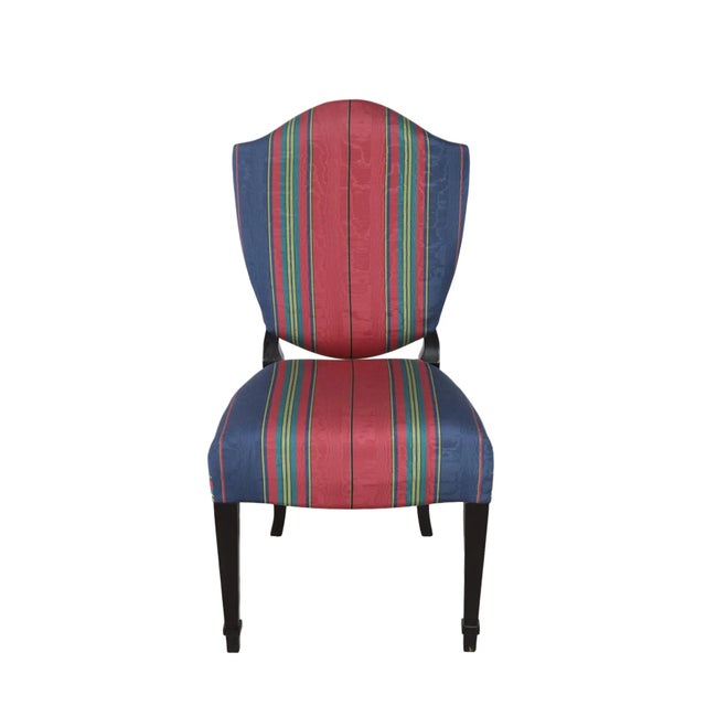 Pair of comfortable red strip fabric backrest chair. The shape of the backrest is the main decorative element of this...