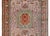 A beautiful vintage Persian Qum silk rug with an eight sided medallion with a floral pattern set amidst a field of myriad...