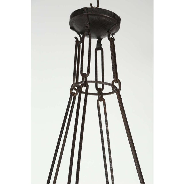 Graceful French iron and glass fixture. Glass is signed Muller Freres. Newly rewired for nine candelabra bulbs; each bulb...
