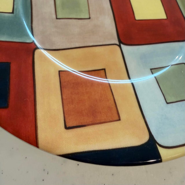Bold geometric Mid-Century Modern/retro-inspired design. Hand-painted 8⅝” salad plates from the discontinued Tabletops...