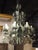 A French Patine Vert Wrought Iron and Tole 8-Light Chandelier, 20th Century For Sale - Image 14 of 18