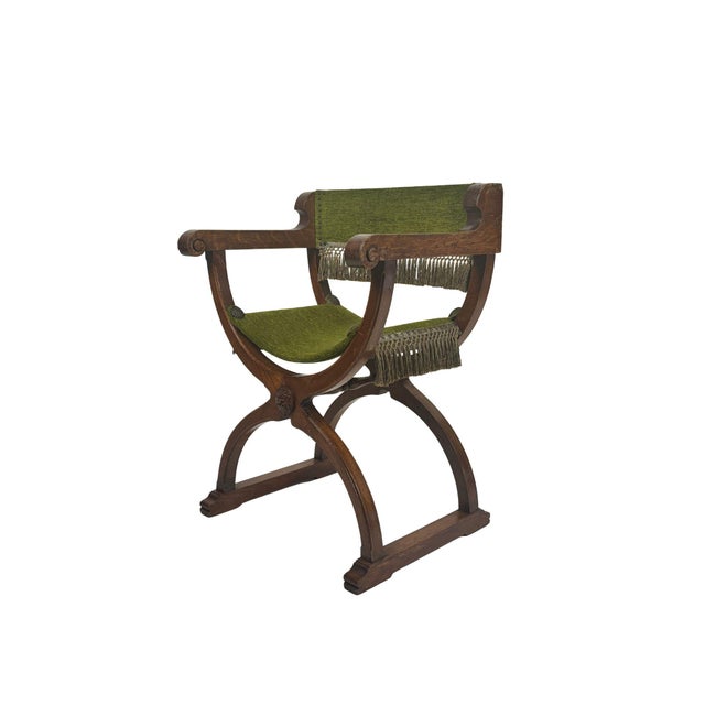 An exceptional Spanish armchair from the 1940s, handcrafted by an unknown cabinetmaker. A truly unique piece,...