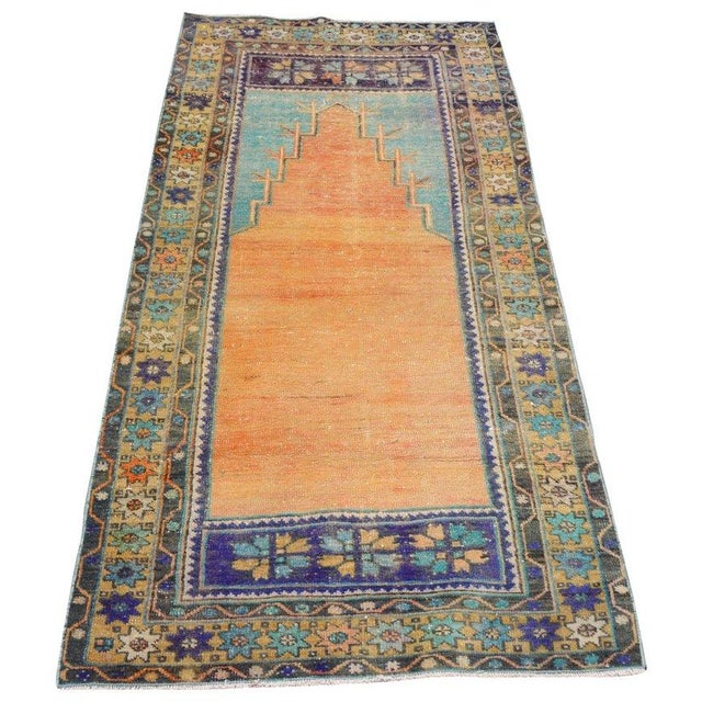 Hand-knotted with care using traditional rug-making techniques, this wool rug blends timeless craftsmanship with a modern...