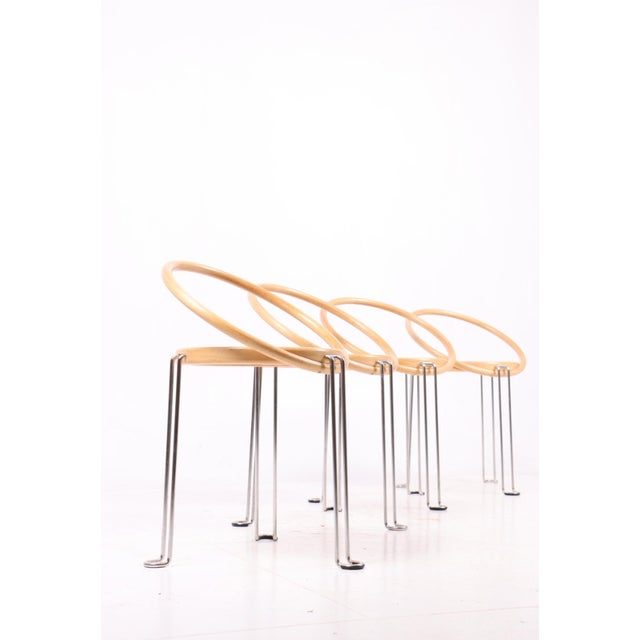 Set of four side chairs, in ash wood, leather and chrome frame. Designed by Börge Lindau for Blå Station. Original...