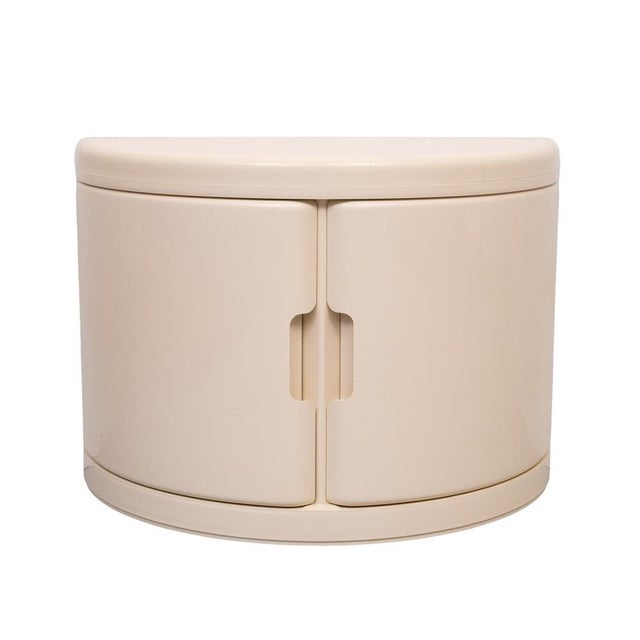 Very nice half moon shaped cabinet ,plastic , can be hang on the wall or beneath the sink , ideal bath room cabinet ,...