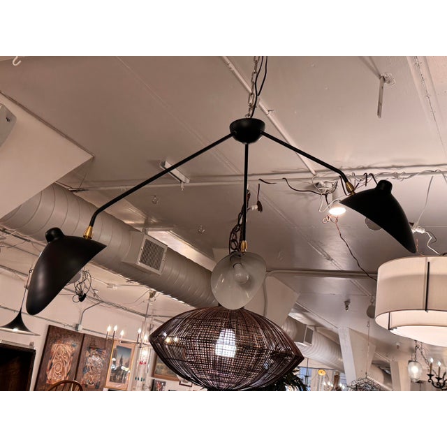 Design Plus Gallery presents the Three Arm Spider Ceiling Lamp style reproduction of Serge Mouille. This sculptural mid-...