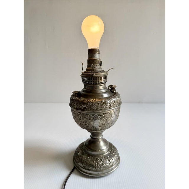 Nice antique lamp by The Meteor Lamp company.