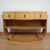 An Art Deco console table by Harry & Lou Epstein. Burr walnut veneered with original walnut handles. Set over U-shaped...