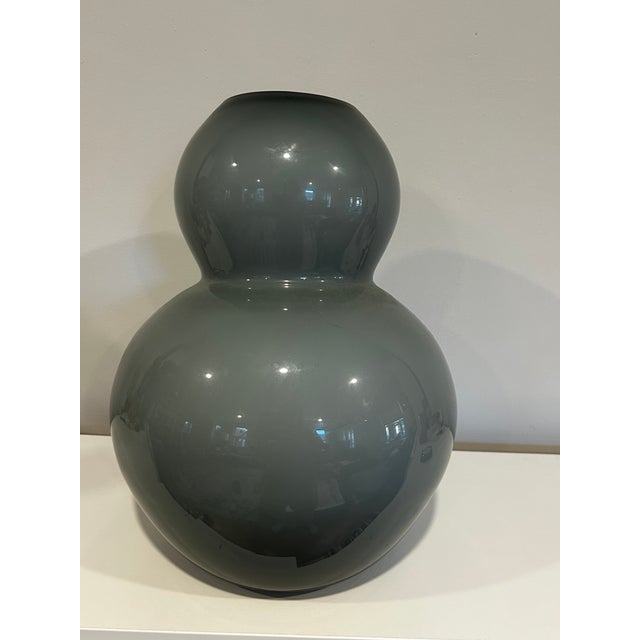 Elevate your space with this striking, large-scale postmodern statement vase. Hand-blown by master glass artisans in...