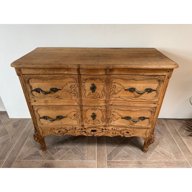 A lovely French 19th Century oak commode chest of drawers. Both deep drawers slide well and provide plenty of storage....
