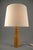An unusually large table lamp designed by Uno Kristiansson for Luxus, Sweden, during the 1970s. The design reflects the...
