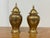 Design Plus Gallery presents a Set of Two Ginger Jar Vessels with Lids in Brass. This impactful duo will brighten any...