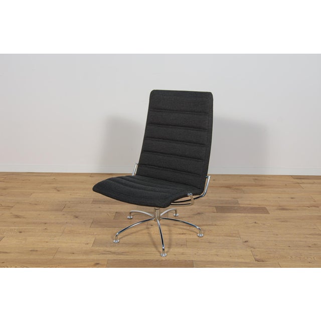 Lounge chair, model "Sas", designed by Jens Amudsen and manufactured by Fritz Hansen in Denmark around 1980. The elegant...