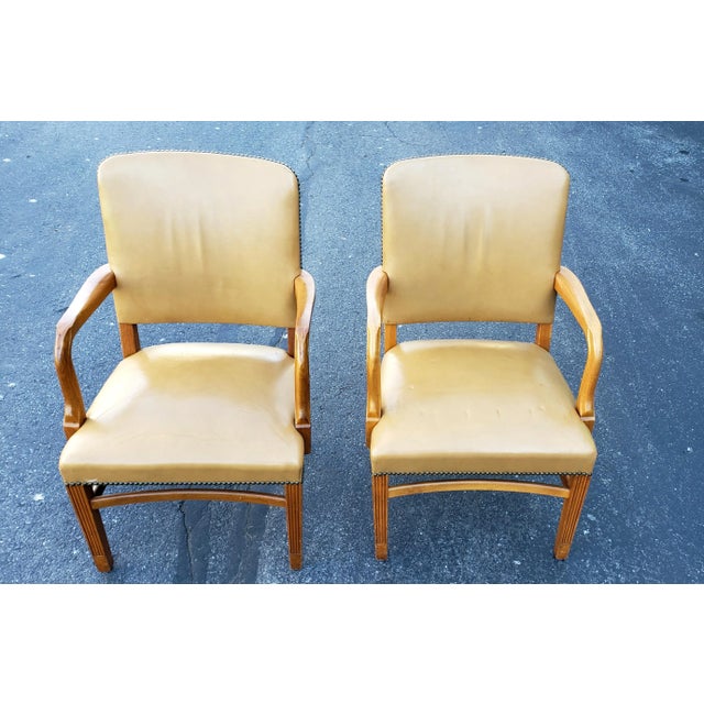 A 1970 pair of Gunlocke Fruitwood and Leather Armchairs in very good vintage condition. Very rare to come ny these days.
