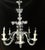Eight-arm blown glass chandelier, artistically formed by hand. Good condition. Several small flowers placed on leaf stalks...