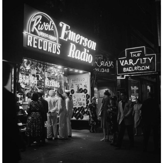 Broadway Radio Shop A shop selling records and radios by Rivoli and Emerson on Broadway, New York City, with the Varsity...