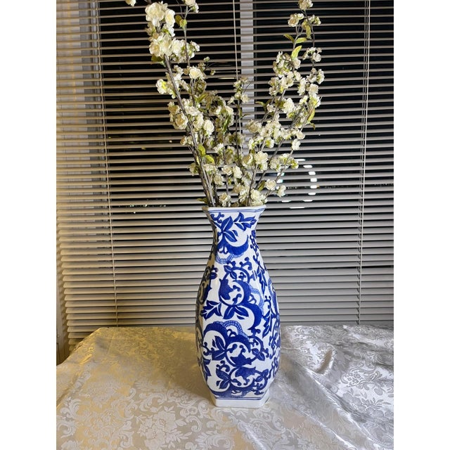 Elevate your space with this stunning 14-inch tall hexagonal baluster vase. This vintage Chinese export piece features a...