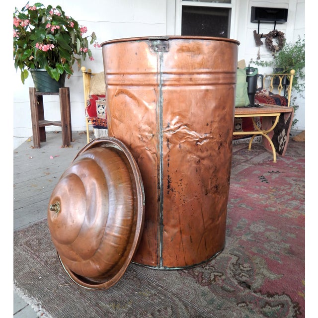 What a life this piece has had. Made entirely of copper is this early 20th century wash boiler. Stands 34" high x 18" in...