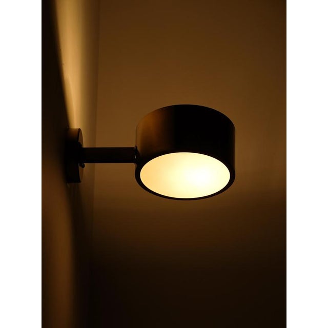 Brass wall lamps designed and produced by Hans-Agne Jakobsson, Markaryd, Sweden, 1960s. This piece is attributed to the...